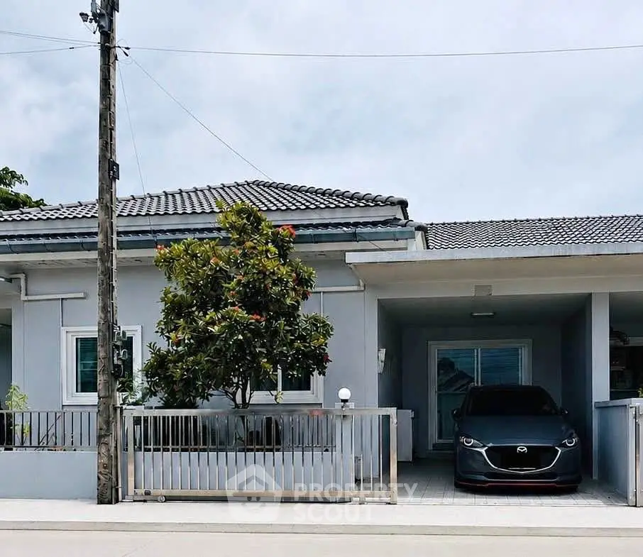 Charming suburban home with modern design and carport, perfect for family living.