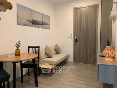 Cozy modern living room with minimalist decor and wooden flooring