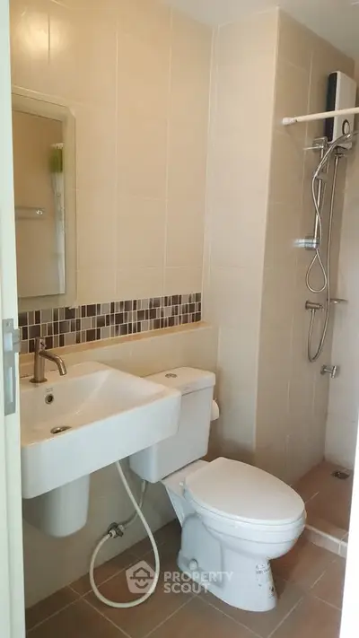 Modern bathroom with sleek fixtures and a walk-in shower, perfect for contemporary living.