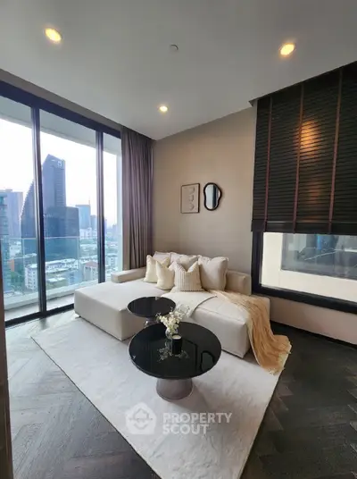 Luxurious modern living room with stunning city view, featuring elegant decor and floor-to-ceiling windows.