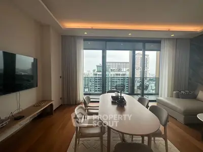 Modern living room with city view and elegant dining area