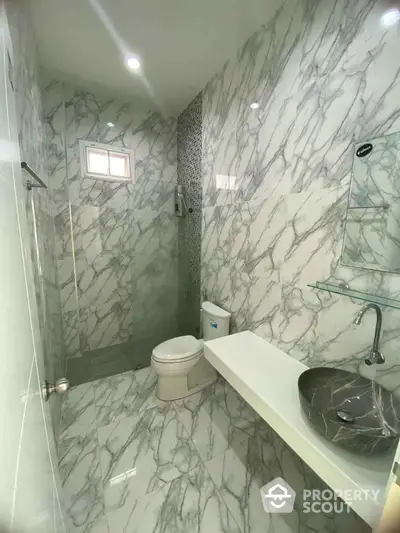 Luxurious marble bathroom with modern fixtures and elegant design