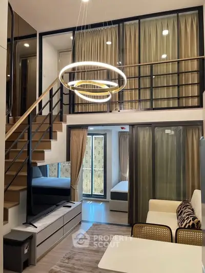 Modern loft apartment with stylish lighting and open layout