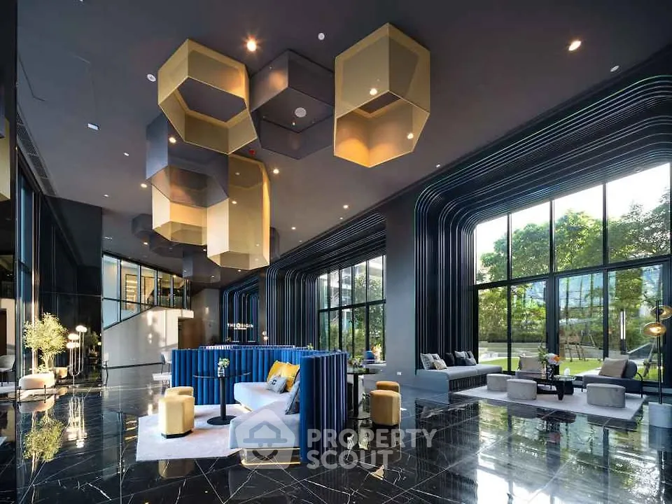 Luxurious modern living room with unique ceiling design and large windows overlooking garden.