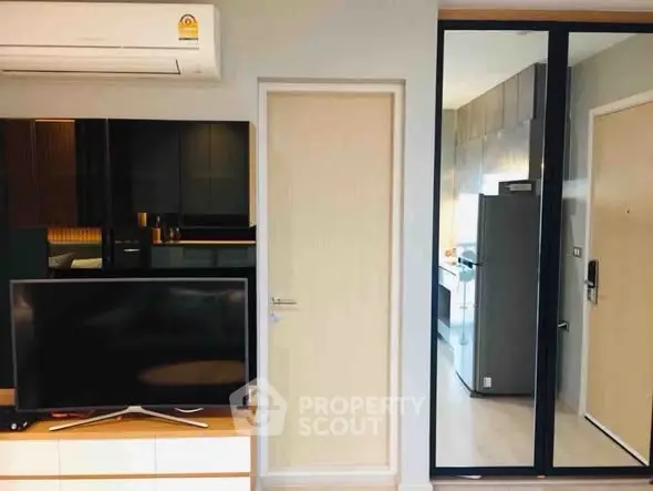 Modern apartment interior with sleek kitchen and living area