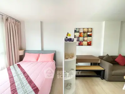 Modern studio apartment with cozy living area and stylish decor