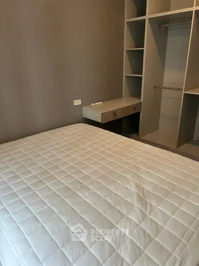 Modern bedroom with built-in storage and comfortable bed