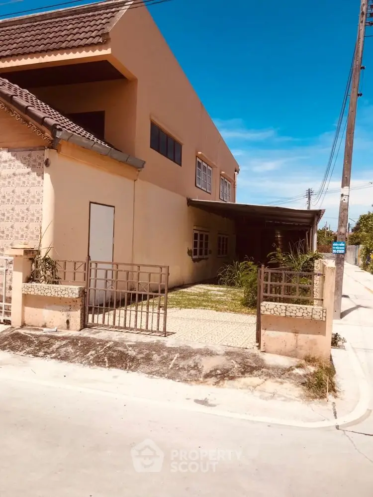 Charming suburban house with spacious front yard and modern design.