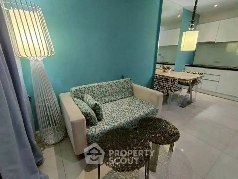 Chic living room with modern decor and open kitchen layout