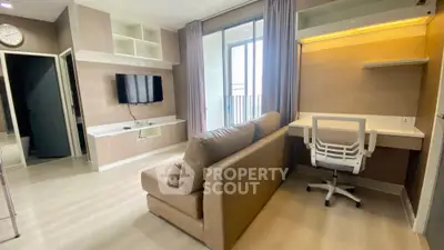 Modern living room with sleek furniture and balcony access