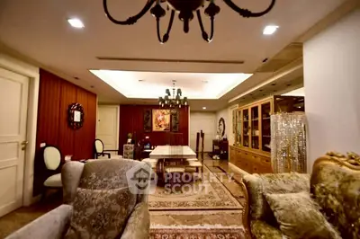 Luxurious living room with elegant decor and chandelier lighting