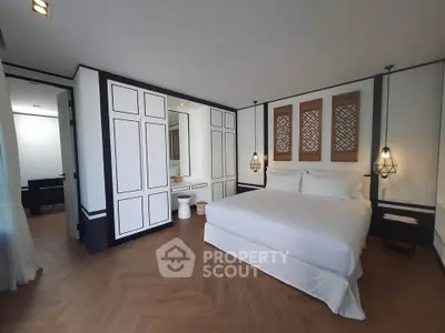 Luxurious modern bedroom with elegant decor and spacious layout