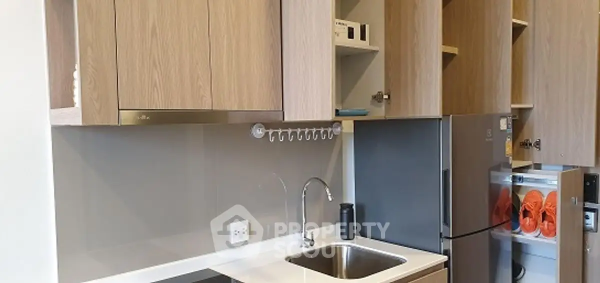 Modern kitchen with sleek cabinets and stainless steel appliances