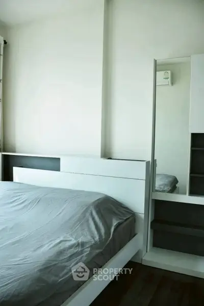 Modern bedroom with sleek design and minimalist furniture