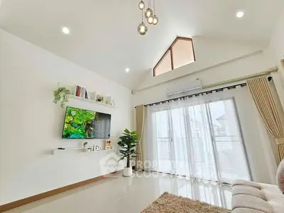 Bright and airy living room with modern decor and large windows