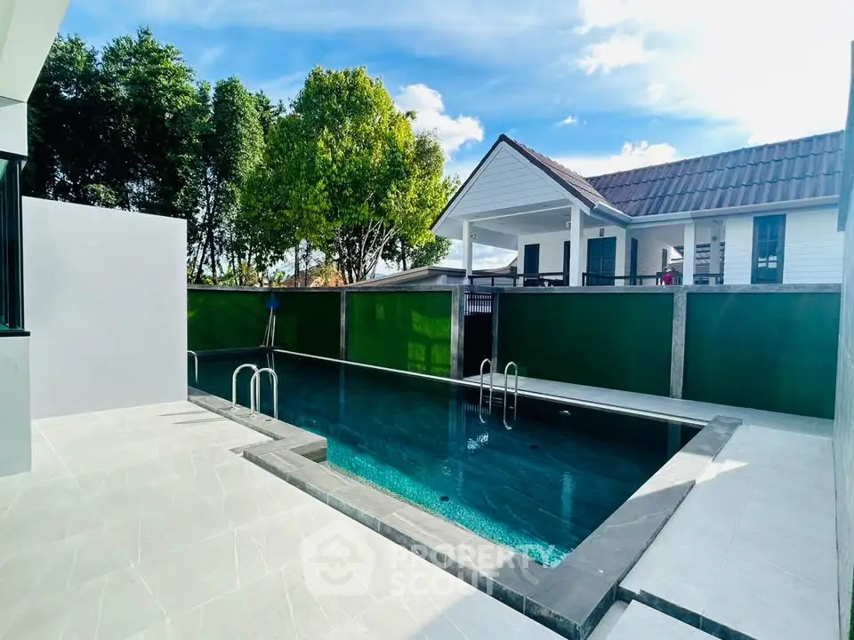 Stunning modern home with private pool and spacious outdoor area, perfect for relaxation and entertainment.