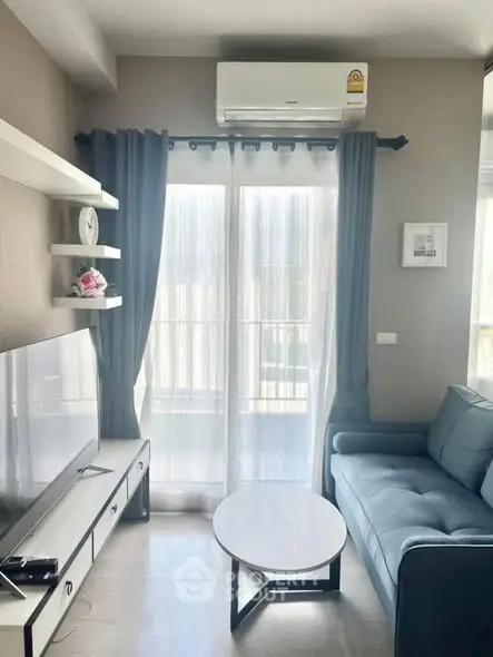 Modern living room with sleek furniture and natural light