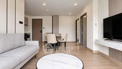 Modern living room with stylish furniture and open layout in a contemporary apartment.