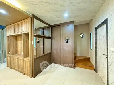 Stylish interior with wooden accents and modern decor in a cozy living space.