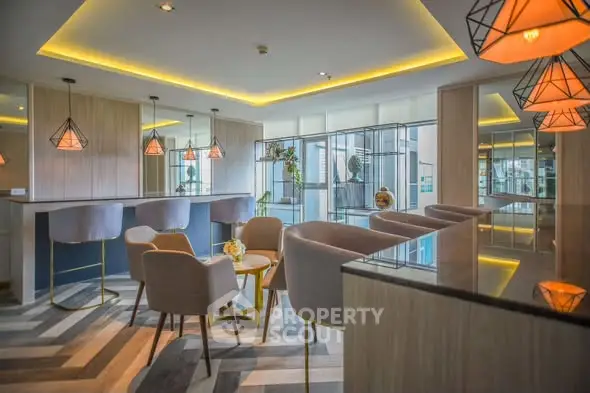 Luxurious modern living room with stylish lighting and elegant furniture.