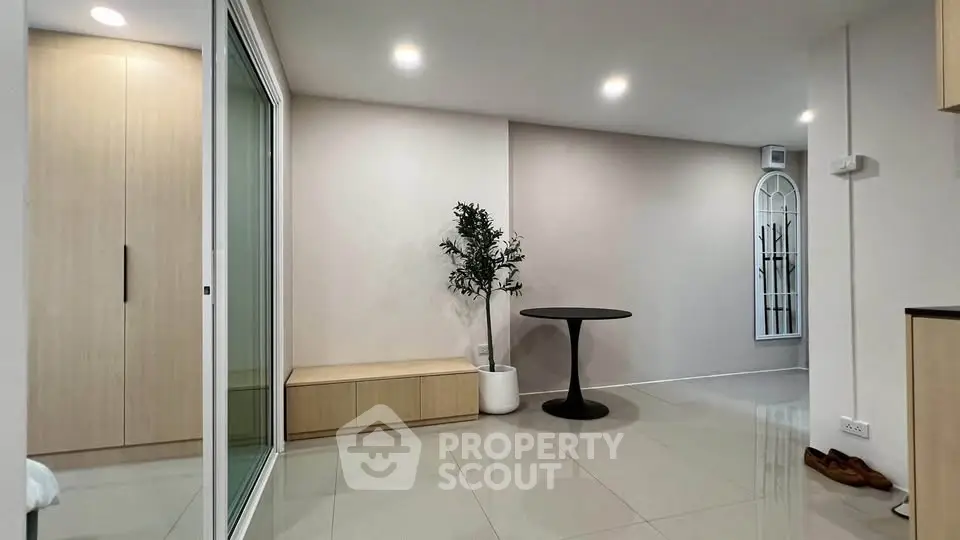 Modern minimalist interior with sleek furniture and neutral tones