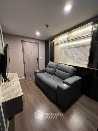 Modern living room with sleek design and comfortable seating