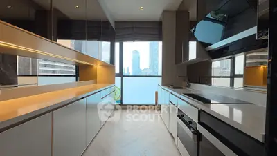 Luxurious modern kitchen with sleek cabinetry and city view, perfect for urban living.