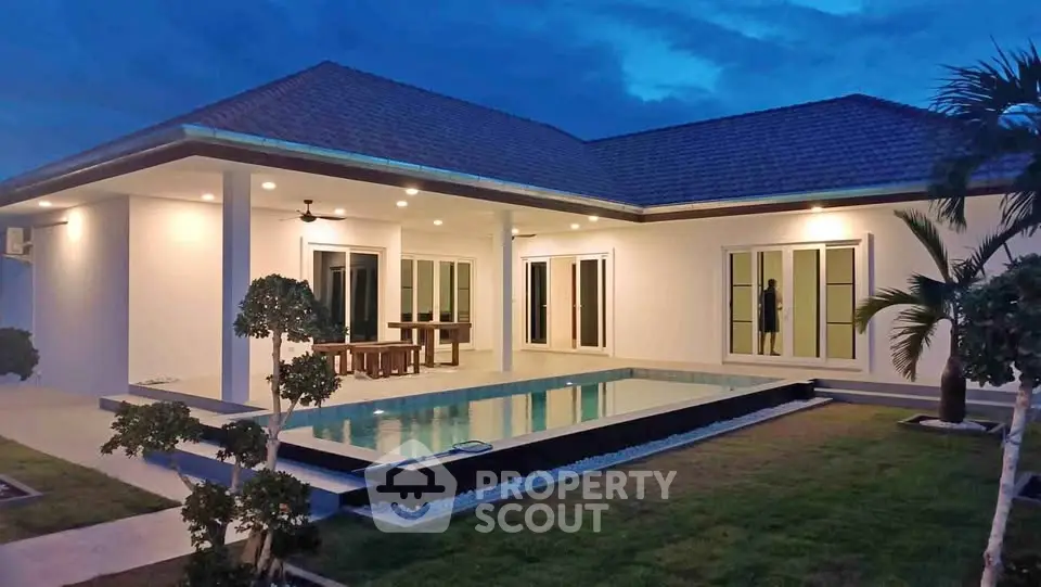 Stunning modern villa with private pool and lush garden, perfect for luxury living.
