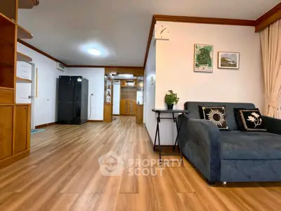 Spacious living room with wooden flooring and modern decor