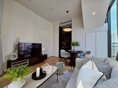 Modern living room with stylish decor and large windows offering city views