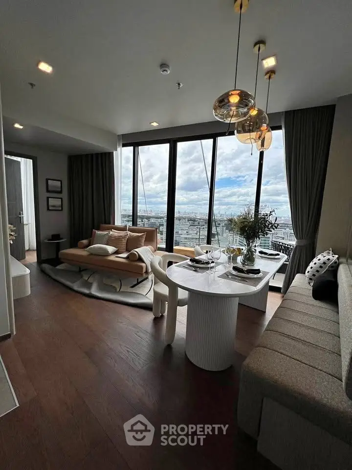 Luxurious living room with stunning city view, modern furniture, and elegant lighting in high-rise apartment.