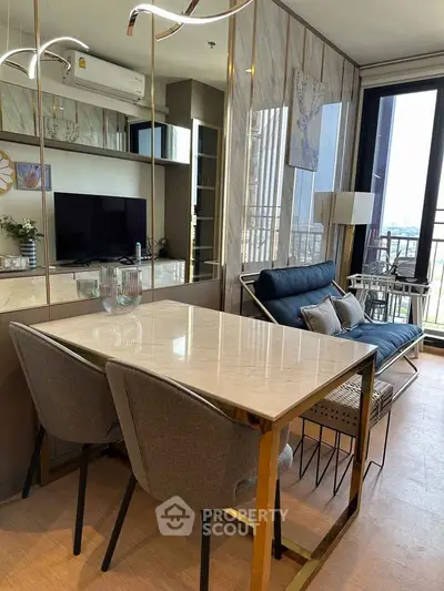 Modern living room with elegant dining area and balcony view in luxury apartment
