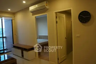 Modern apartment interior with air conditioning and balcony view