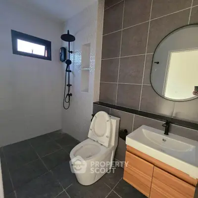 Modern bathroom with sleek fixtures and stylish tile design