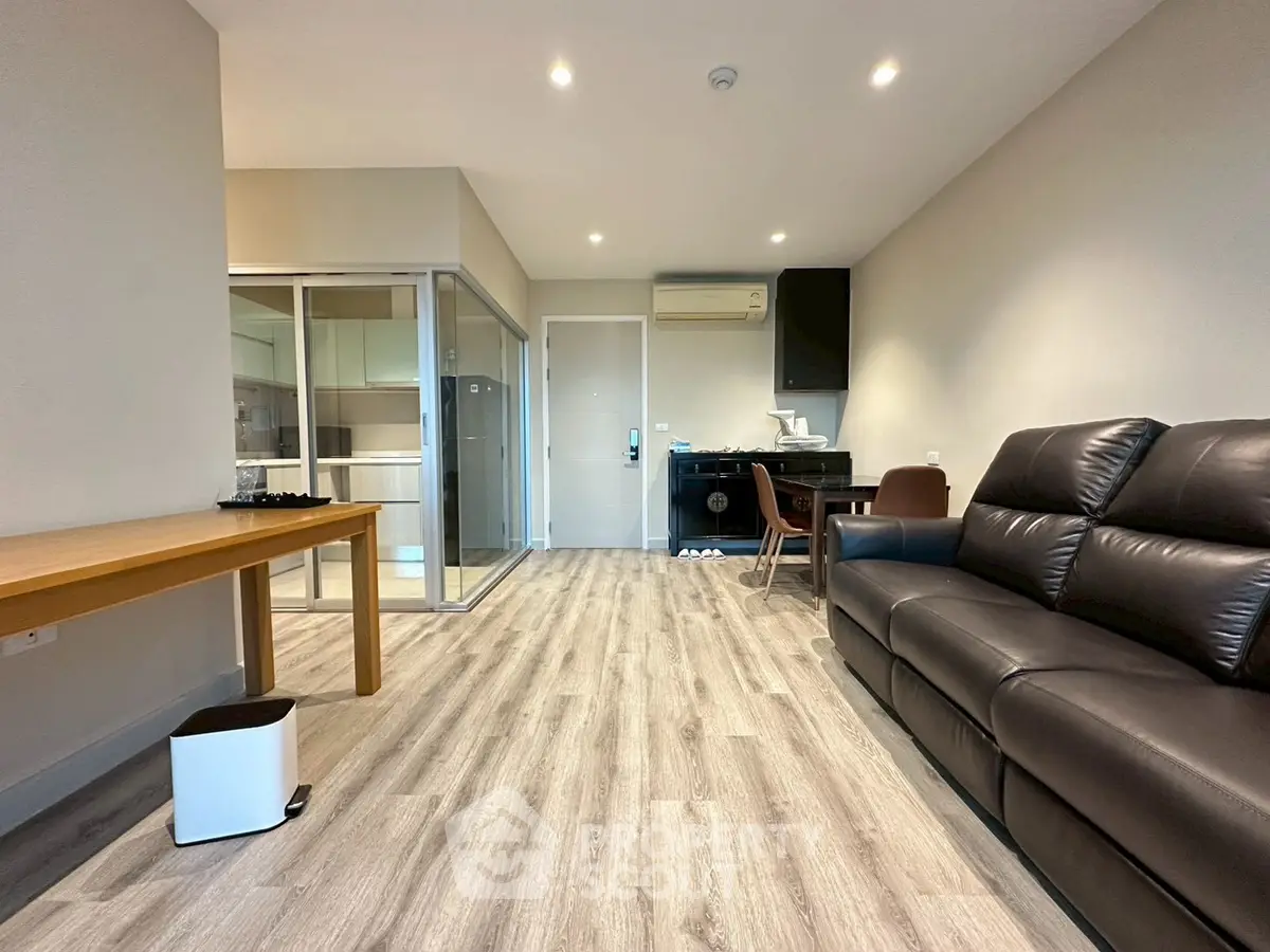 Modern living room with sleek flooring and stylish furniture