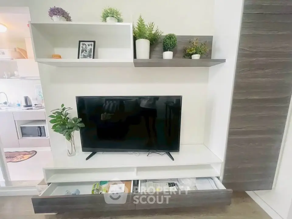 Modern living room with sleek TV unit and stylish decor