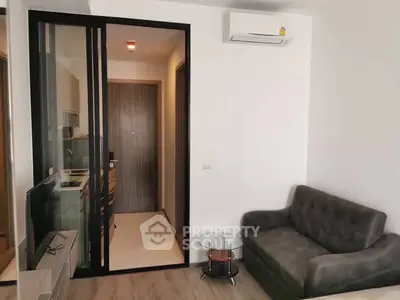 Modern living room with sleek design and air conditioning