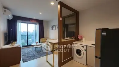 Modern apartment with open layout, featuring a cozy living room and kitchen with city view.