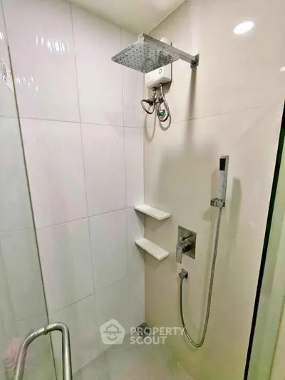 Modern bathroom with sleek shower fixtures and minimalist design