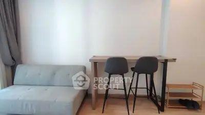Modern minimalist living room with stylish furniture and cozy ambiance.