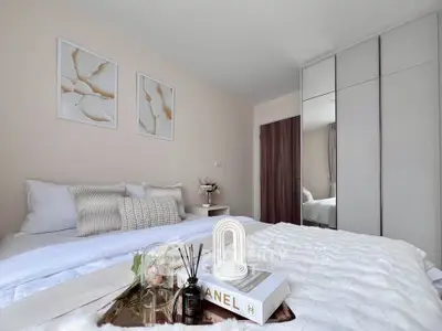 Elegant bedroom with modern decor and stylish furnishings