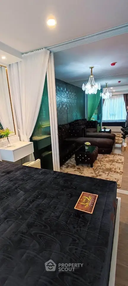 Luxurious living room with elegant decor and plush seating in a modern apartment.