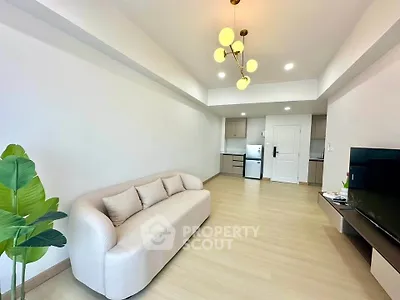 Modern living room with stylish sofa and elegant lighting