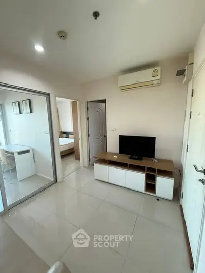 Modern apartment living room with sleek furniture and air conditioning