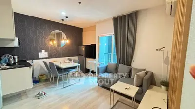 Modern living room with open kitchen and stylish decor