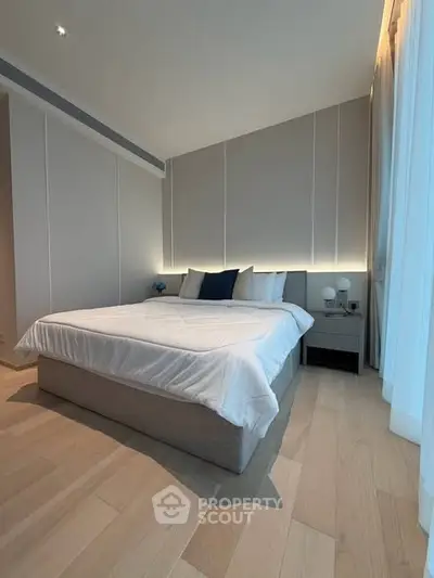 Luxurious modern bedroom with elegant lighting and stylish decor