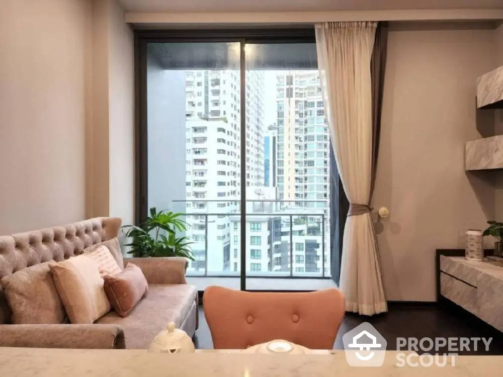 Elegant living room with plush seating and modern decor, floor-to-ceiling windows offering a cityscape view, creating a luxurious urban oasis.