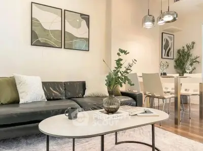 Modern living room with stylish decor and elegant dining area