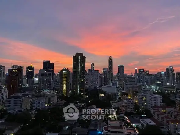 Stunning city skyline view at sunset with vibrant colors and modern architecture.