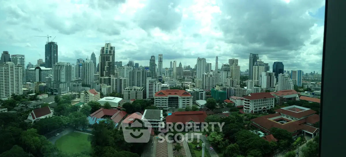 Stunning cityscape view showcasing a vibrant urban skyline with lush greenery and modern architecture.